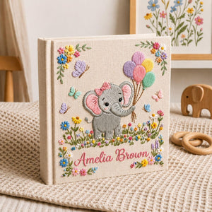 Personalized hand embroidered photo album featuring cute elephant holding colorful balloons surrounded by flowers butterflies and custom name embroidery