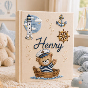 Personalized hand embroidered baby photo album with sailor teddy bear boat lighthouse and nautical nursery design