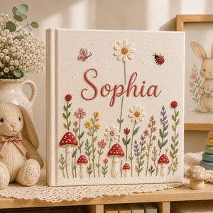 Personalized hand embroidered baby photo album with wildflowers mushrooms butterflies and ladybugs
