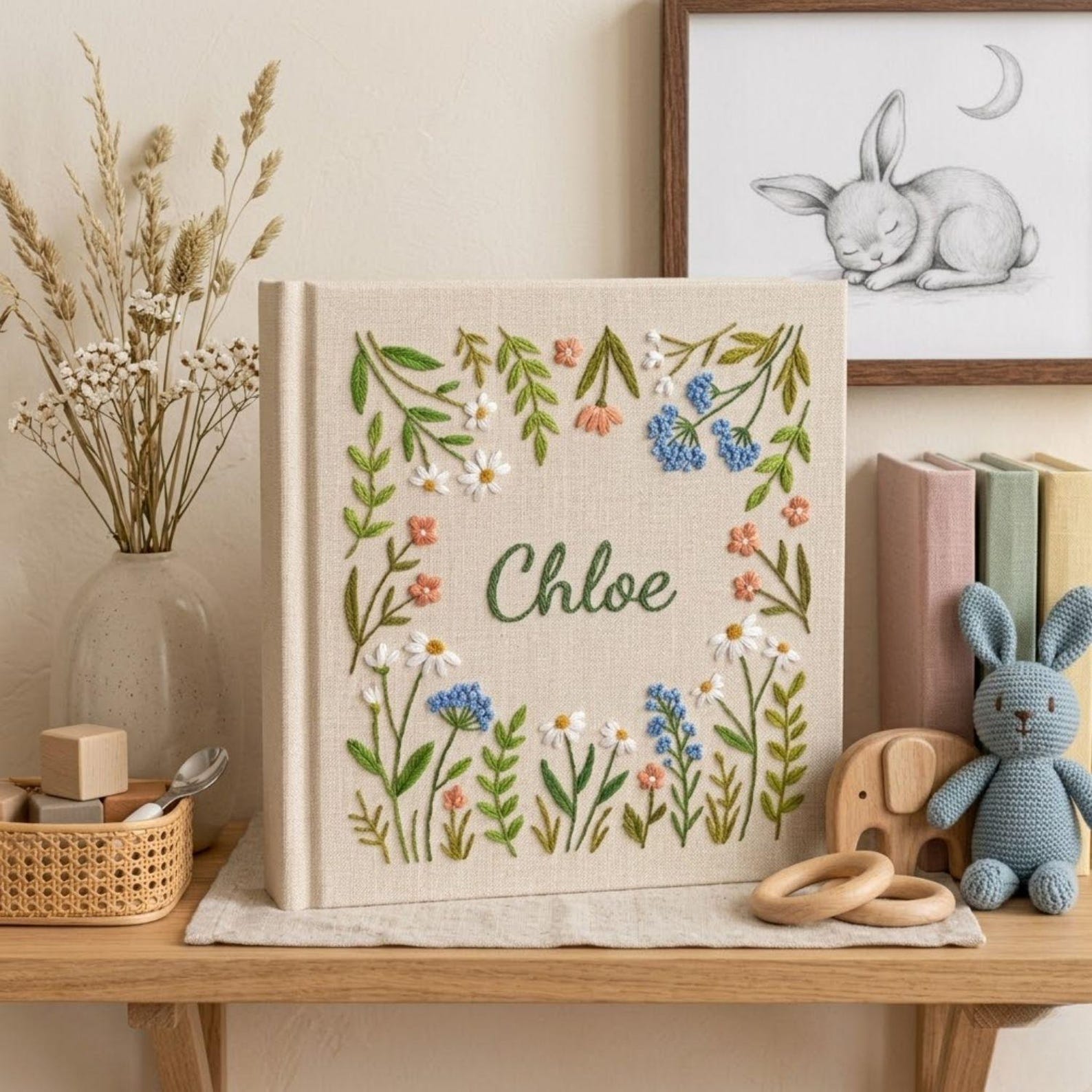 Personalized wildflower garden hand embroidered baby photo album with botanical floral meadow design on linen cover