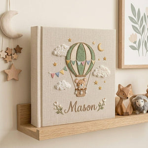 Personalized mouse hot air balloon embroidered baby photo album with whimsical nursery design on linen cover