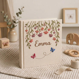 Personalized hanging floral butterfly hand embroidered baby photo album with botanical flower design on linen cover