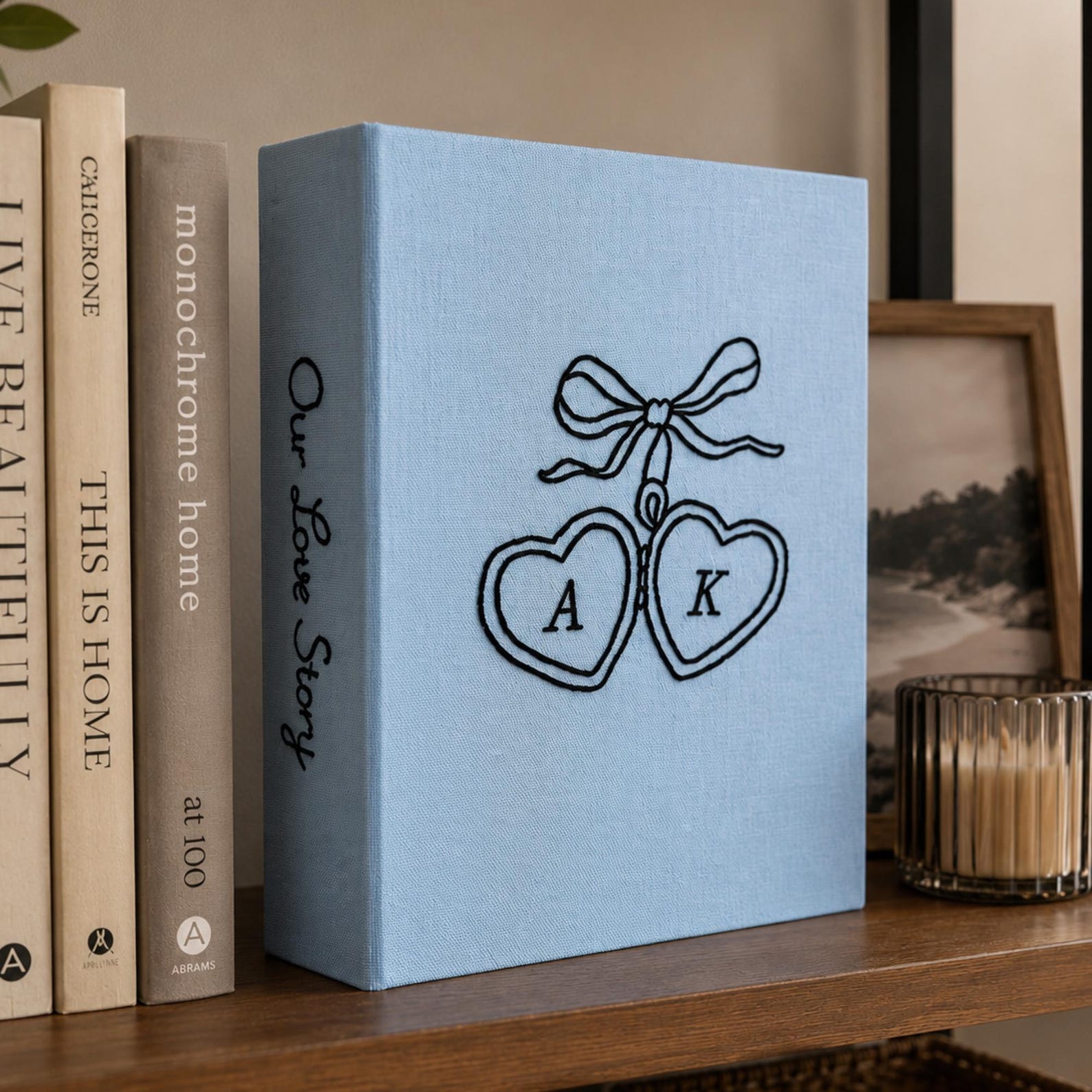 Personalized minimalist embroidered couple photo album with heart initials design on blue linen cover