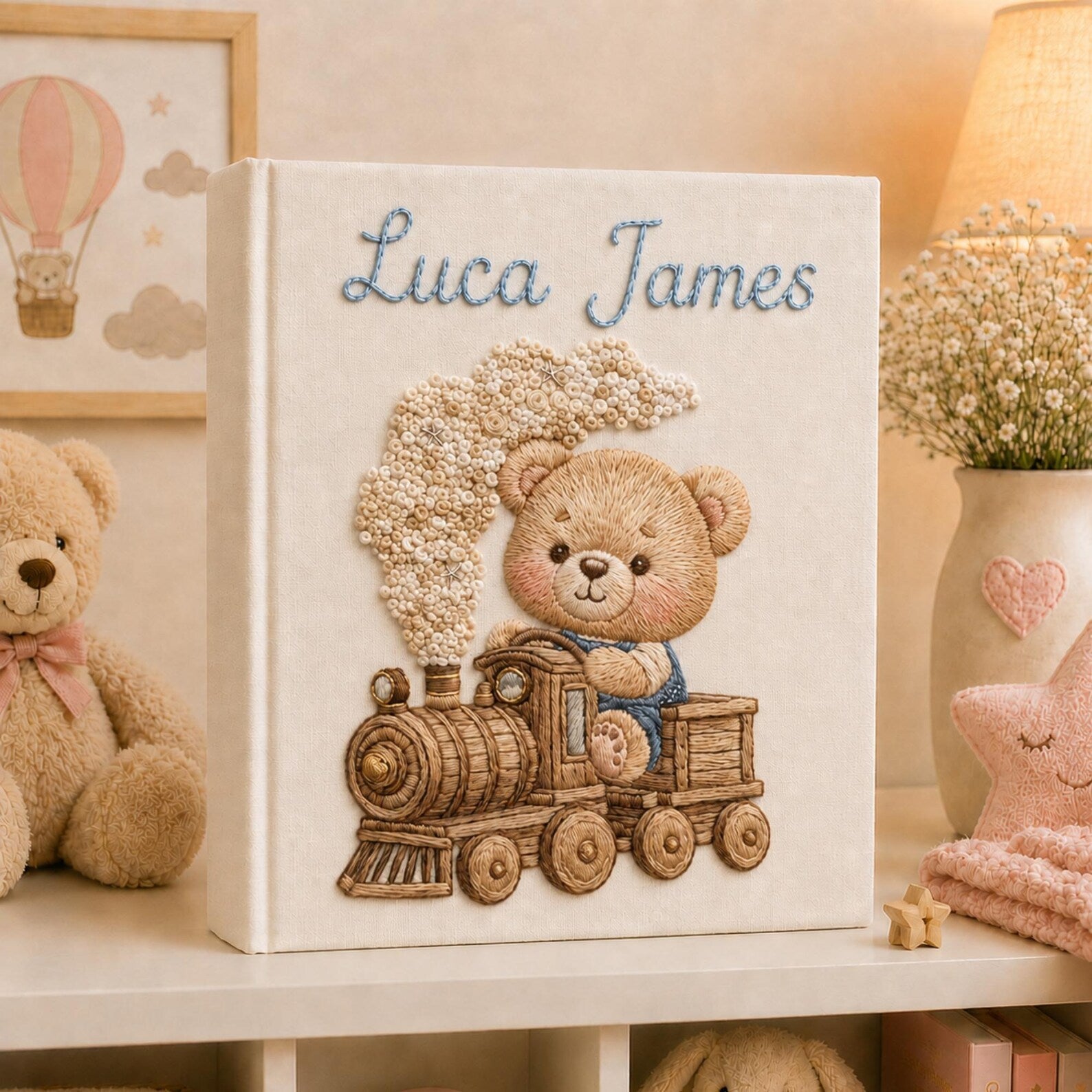 Personalized hand embroidered baby photo album with teddy bear riding a vintage steam train