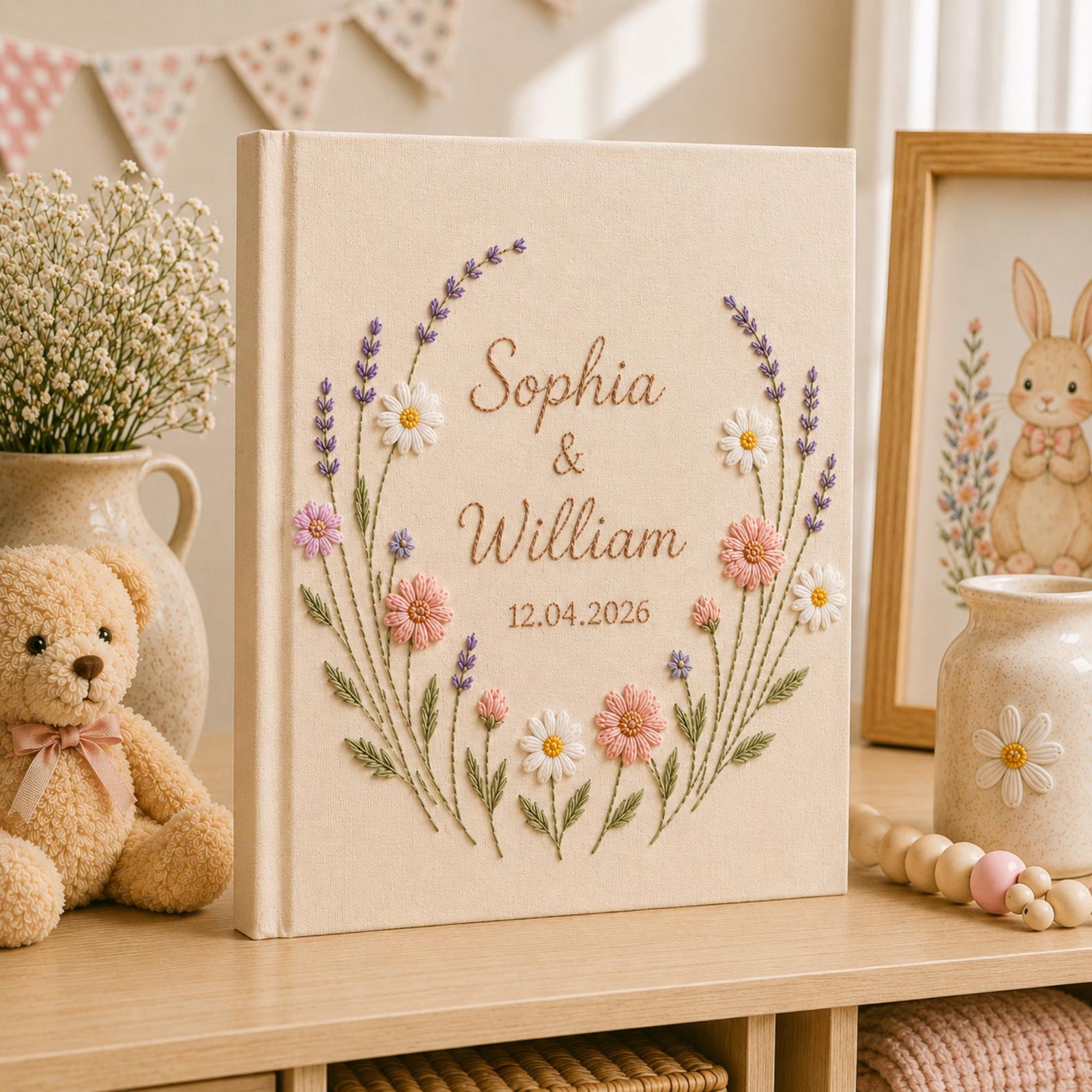 Custom lavender floral embroidered wedding photo albums with pastel botanical wreaths, daisy flowers, and personalized couple names on linen covers