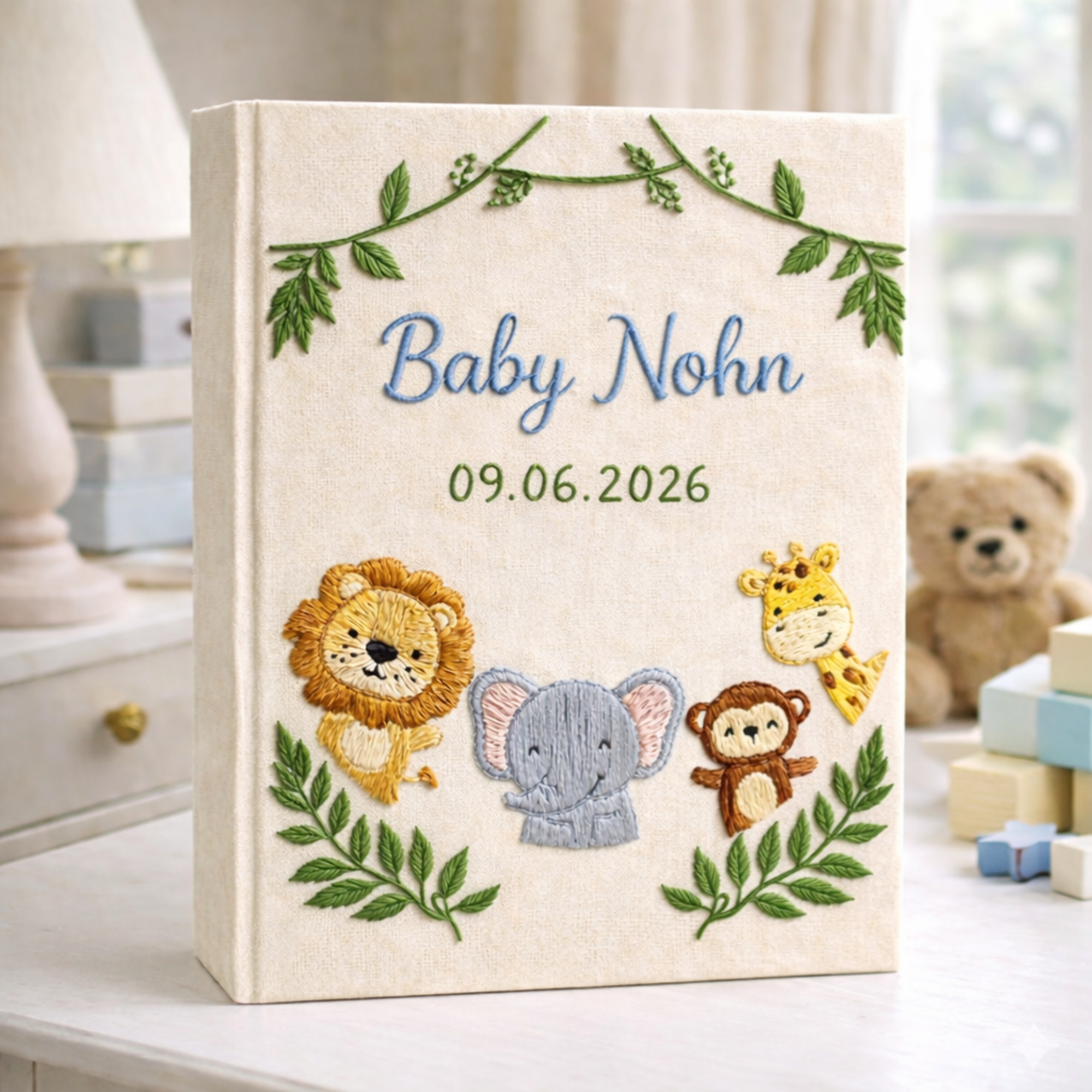Personalized hand embroidered photo album featuring safari animals and custom birth statistics including weight, length, and birth time