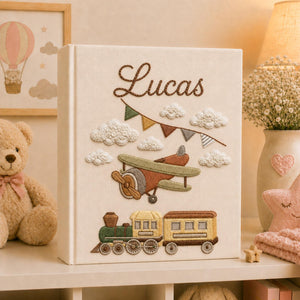 Personalized vintage airplane and train hand embroidered photo album with custom baby name