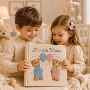 Personalized embroidered baby photo album featuring two teddy bears with pastel balloons and custom names