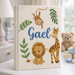 Personalized hand embroidered photo album featuring safari animals and custom birth statistics including weight, length, and birth time