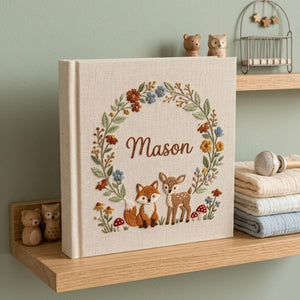 Personalized woodland fox and deer embroidered baby photo album with floral wreath and custom name on linen cover
