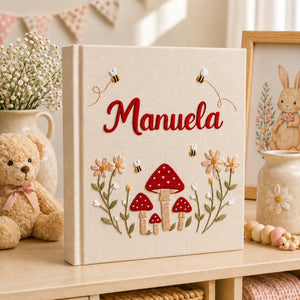 Personalized hand embroidered baby photo album with red mushrooms flowers and bees
