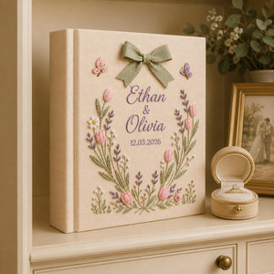 Personalized hand embroidered tulip floral wedding photo album with bow detail and custom couple names on linen cover