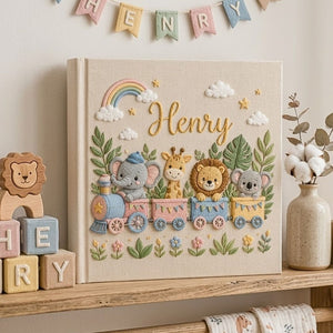 Personalized hand embroidered photo album featuring a safari animal train with elephant giraffe lion and koala in a tropical jungle setting