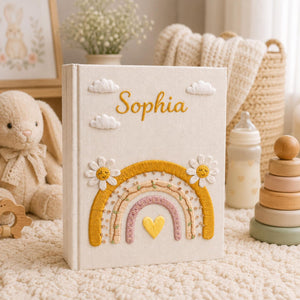 Personalized rainbow hand embroidered photo album with daisy flowers and pastel nursery keepsake design