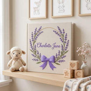 Personalized hand embroidered photo album featuring a lavender floral wreath with an elegant purple bow on a premium linen cover customized with a name
