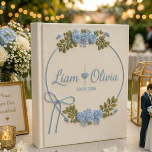 Personalized wedding photo album with blue floral wreath embroidery custom couple names and wedding date on linen cover