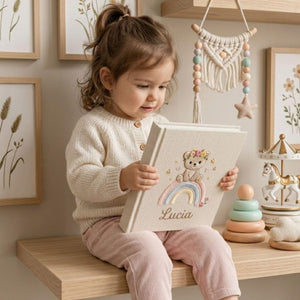 Personalized rainbow teddy bear embroidered baby photo album with pastel rainbow and custom name on linen cover