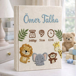 Personalized hand embroidered photo album featuring safari animals and custom birth statistics including weight, length, and birth time