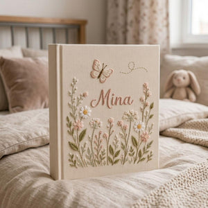 Personalized wildflower butterfly hand embroidered baby photo album with floral botanical design on linen cover
