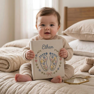 Personalized baby feet hand embroidered photo album with floral pastel footprint design on linen cover