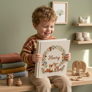 Personalized woodland fox and deer embroidered baby photo album with floral wreath and custom name on linen cover