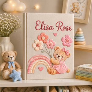 Personalized hand embroidered baby photo album with teddy bear, pastel rainbow, and pink floral embroidery