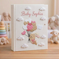 Personalized hand embroidered photo album featuring a bunny holding pastel heart balloons floating among fluffy clouds