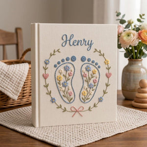 Personalized baby feet hand embroidered photo album with floral pastel footprint design on linen cover