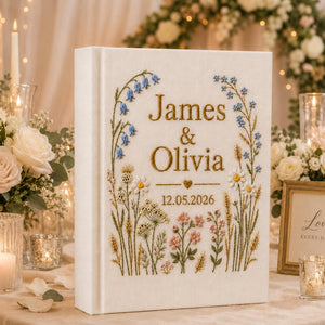 Personalized hand embroidered wildflower wedding photo album with botanical floral design and custom names on linen cover