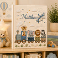 Personalized hand embroidered photo album featuring an adventure train with animal friends, stars, clouds and vintage airplane