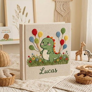 Personalized dinosaur hand embroidered baby photo album with colorful balloons and custom name on linen cover