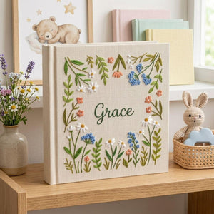 Personalized wildflower garden hand embroidered baby photo album with botanical floral meadow design on linen cover
