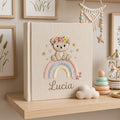 Personalized rainbow teddy bear embroidered baby photo album with pastel rainbow and custom name on linen cover