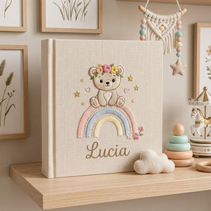 Personalized rainbow teddy bear embroidered baby photo album with pastel rainbow and custom name on linen cover