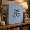 Personalized minimalist embroidered couple photo album with heart initials design on blue linen cover