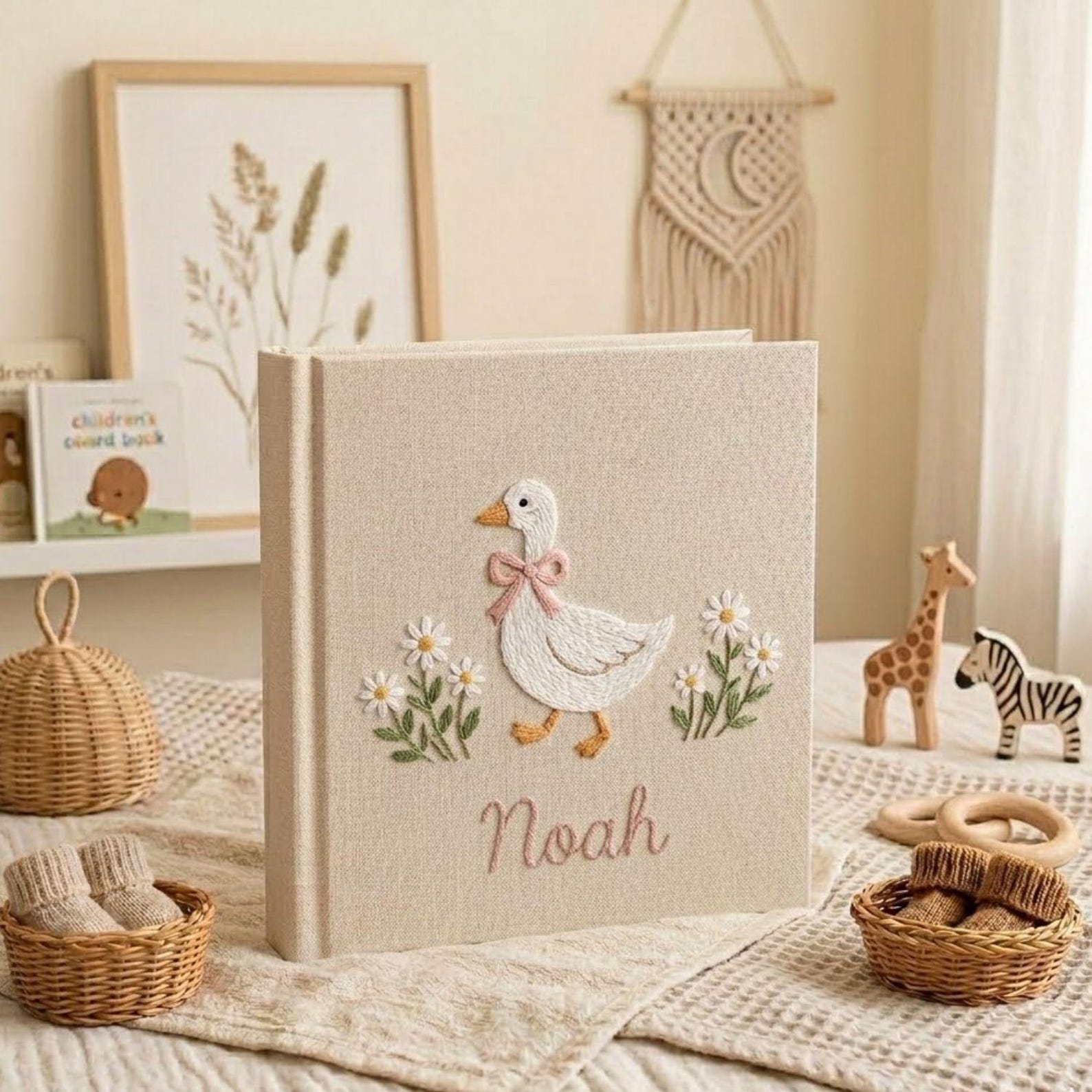 Personalized goose hand embroidered baby photo album with daisy floral cottagecore nursery design on linen cover