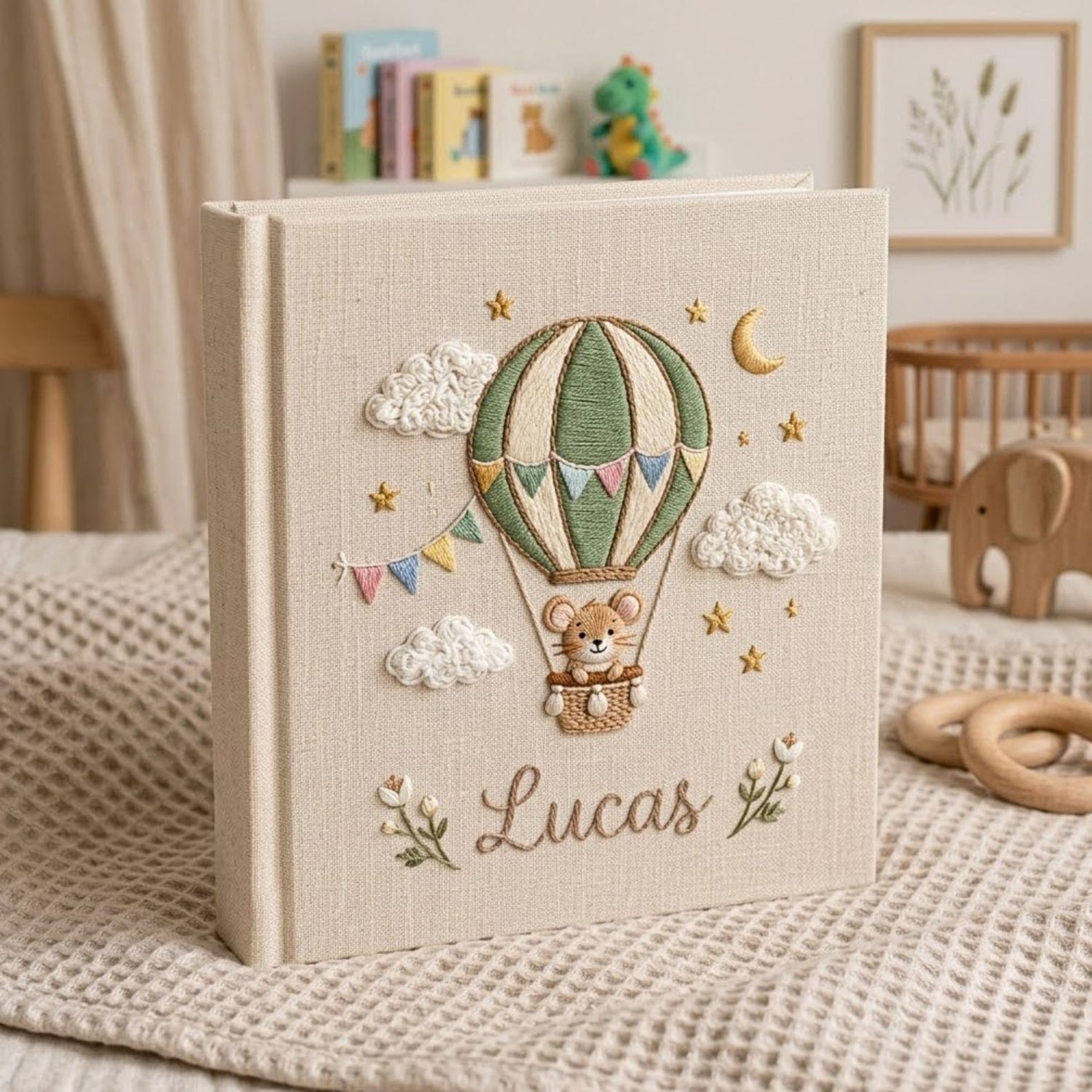Personalized mouse hot air balloon embroidered baby photo album with whimsical nursery design on linen cover