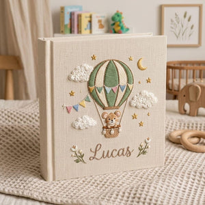 Personalized mouse hot air balloon embroidered baby photo album with whimsical nursery design on linen cover