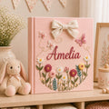 Personalized pink embroidered baby photo album with butterflies and colorful floral garden design