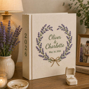 Personalized lavender embroidered wedding photo album with custom names, wedding date, floral wreath embroidery, and linen hardcover design