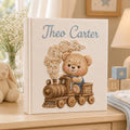 Personalized hand embroidered baby photo album with teddy bear riding a vintage steam train