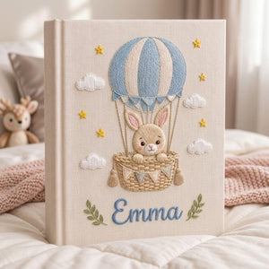 Personalized bunny balloon hand embroidered baby photo album with hot air balloon cloud and star design on linen cover