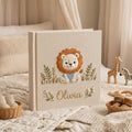 Personalized baby lion hand embroidered photo album with safari botanical design on linen cover