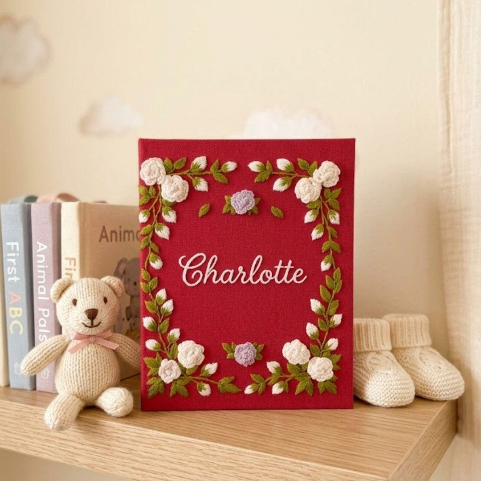 Personalized floral frame hand embroidered baby photo album with embroidered roses and greenery on berry red linen cover