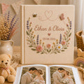 Personalized embroidered wedding photo album with pastel flowers lavender butterflies and custom couple names on linen cover