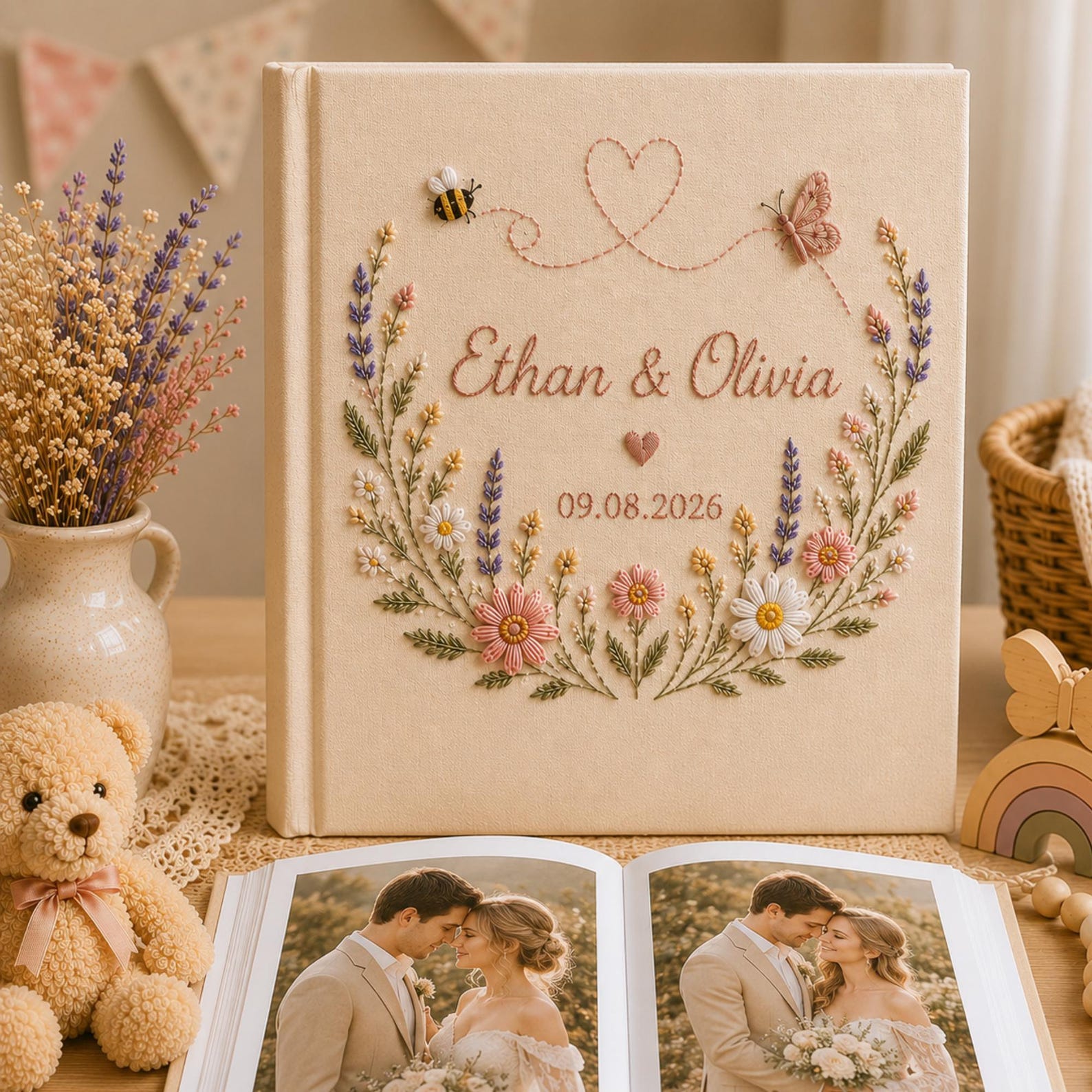 Personalized embroidered wedding photo album with pastel flowers lavender butterflies and custom couple names on linen cover