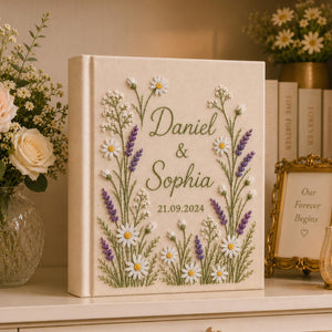 Personalized hand embroidered daisy lavender wedding photo album with botanical floral embroidery and custom names on linen cover