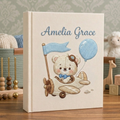 Personalized hand embroidered photo album featuring a vintage aviator teddy bear flying a classic airplane with balloon and banner details