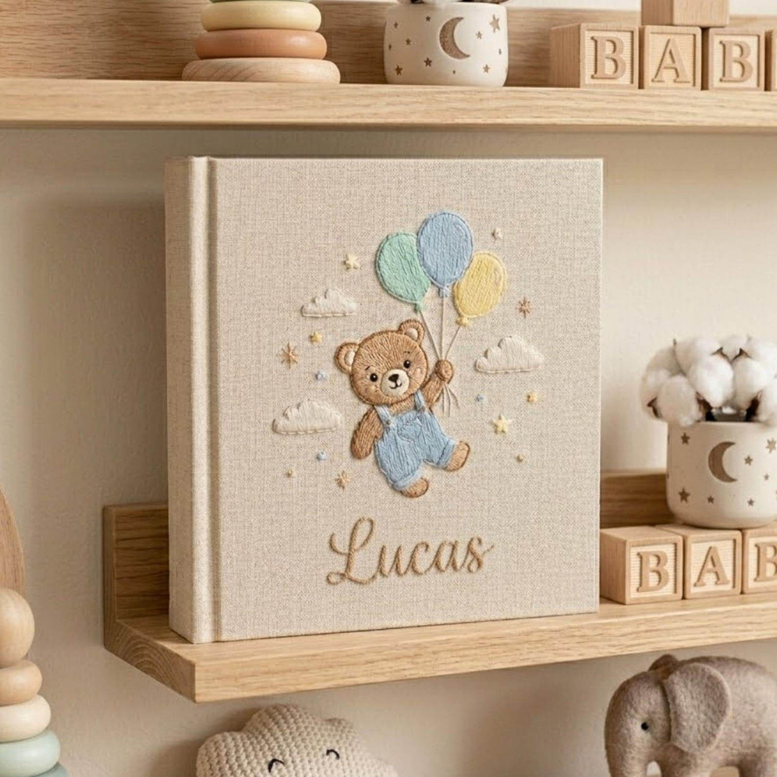 Personalized teddy balloon hand embroidered baby photo album with pastel nursery design on linen cover