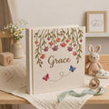 Personalized hanging floral butterfly hand embroidered baby photo album with botanical flower design on linen cover